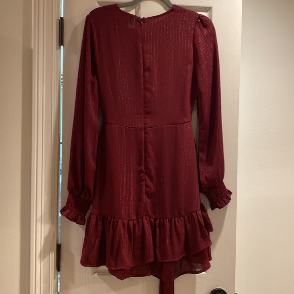 Long sleeve maroon dress with ruffle bottom and tie waist - Picture 2 of 3